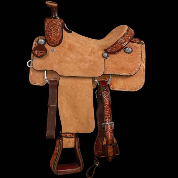 Mollys custom SilverOur Roughout Roper with a roughout seat has tooled leather on the Cheyenne roll, pommel and stirrups.  Full flank cinch.  This great saddle comes with your choce of concho style, seat and gullet size.  41 pounds.

More customization 